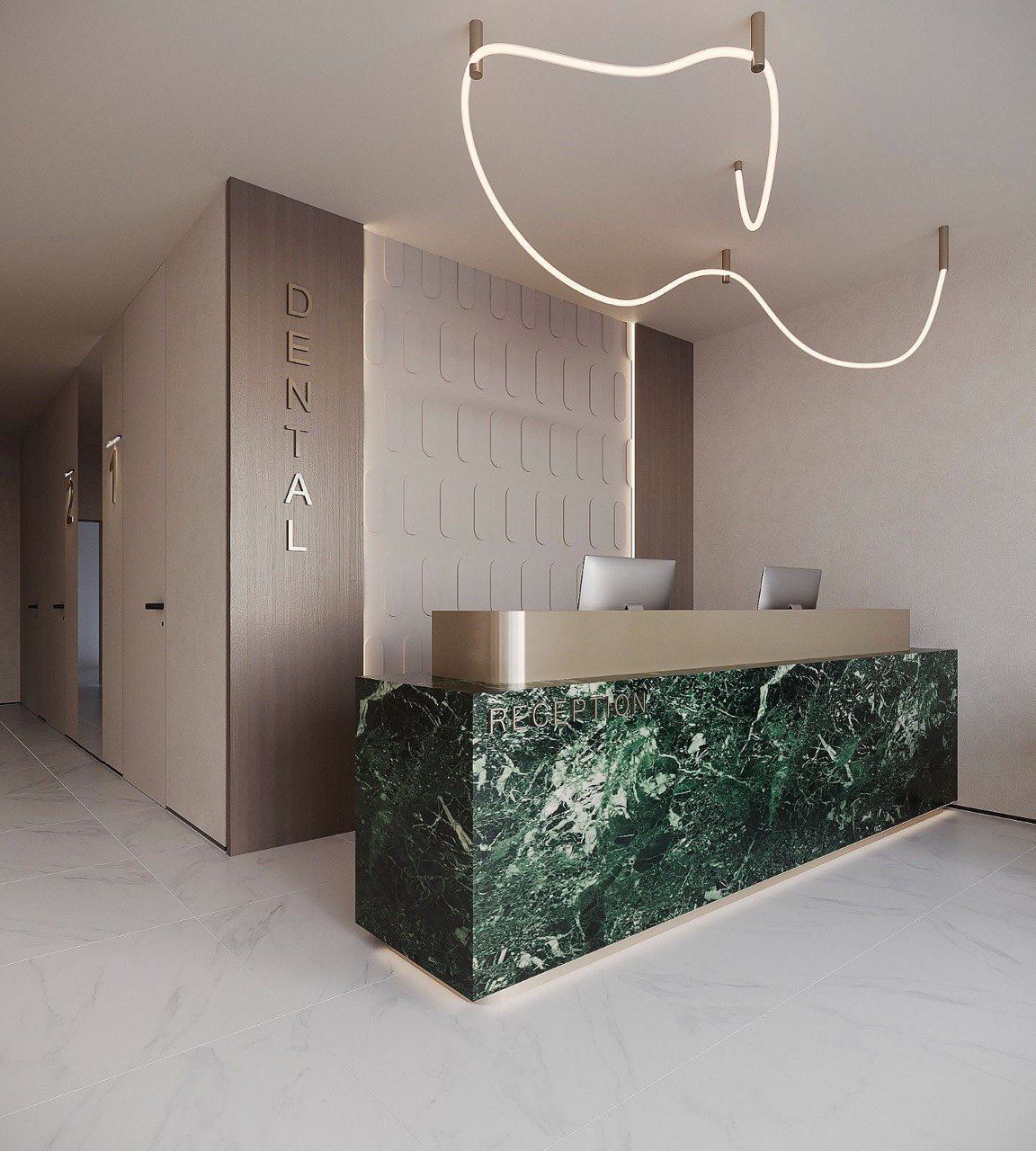 Dental clinic reception with green marble desk